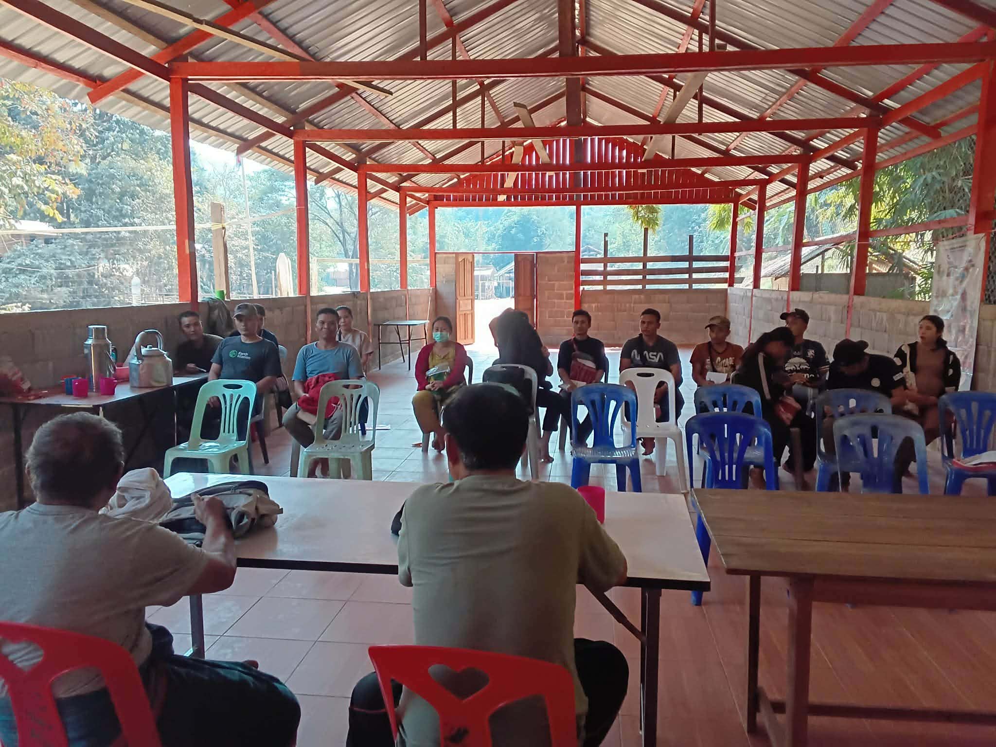 Medical team trekking with supplies to a remote village